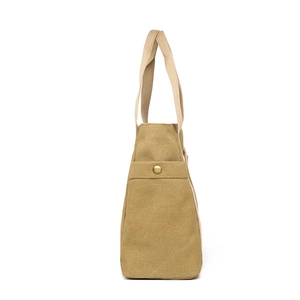 Grand sac cabas minimaliste en toile kaki avec des poignées renforcées en sangle large