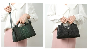 Close-up of crocodile pattern leather texture with metal V logo on dual color bags