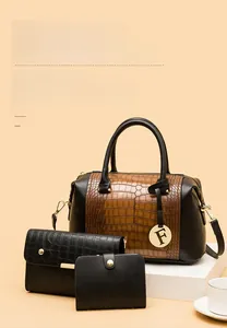 Three-piece women bag set featuring crocodile embossed tote with gold F charm detail