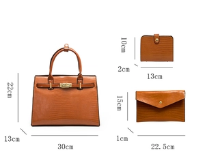 Detailed view of 3-piece brown embossed tote bag set with dimensions and metallic lock