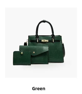 Detailed set of 3 green lizard pattern bags featuring large tote and envelope clutch