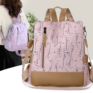 Détail du sac à dos antivol en nylon imperméable avec options lavande et imprimé fleuri