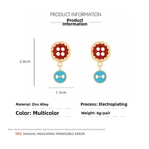 Detail showing colorful enamel button earrings with 2.8cm length and 1.3cm width dimensions