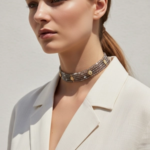 Bohemian multi-layer handmade beaded choker with vintage gold accents on a model