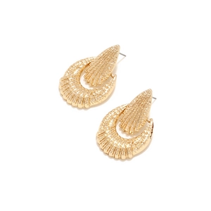 Detail of gold geometric earrings featuring hammered textures and sunburst patterns