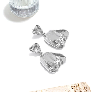 Silver double-layered tulip earrings with irregular metallic texture and polished finish