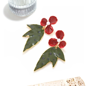 Red flower and green leaf drop earrings with enamel finish and white faux pearl detail