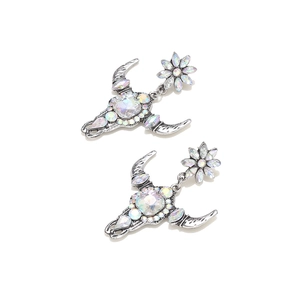 Bohemian silver bull head earrings with sparkling AB rhinestones and western cattle charms