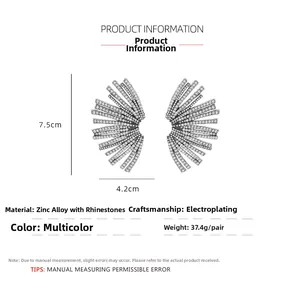 Detailed size view of silver fan-shaped earrings with rhinestones, 7.5cm height