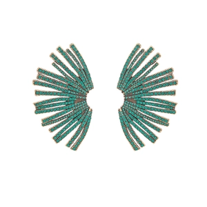 Detailed close-up of fan-shaped stud earrings with green rhinestones in a gold setting