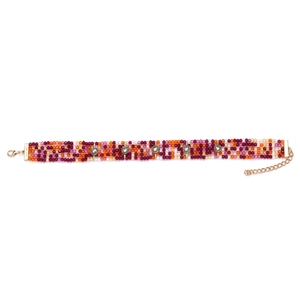 Detailed view of bohemian multilayer beaded necklace with five crystal accents and gold clasp
