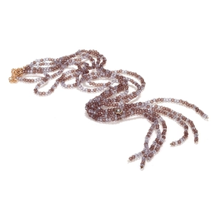 Detail view of multi-layer beaded necklace with lavender faceted beads and gold clasp