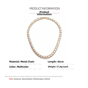 Detail of mixed silver and gold square beads on a 46cm length metal chain necklace
