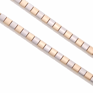 Two-tone gold and silver square link necklace with a modern minimalist metal design