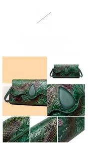 Detailed relief of koi fish and lotus flowers on a dark green vintage leather crossbody bag
