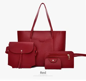 Dettaglio del set di 4 borse rosse in pelle PU a grana litchi con borsa a tracolla con nappa