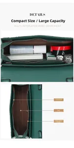 Detail view of ethnic embossed crossbody bag interior with multiple compartments