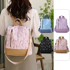 Sac à dos en nylon imperméable pour femme avec imprimé floral en rose, bleu et violet