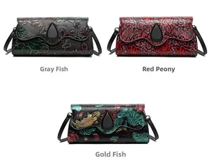 Detailed close-up of embossed floral patterns and koi fish on ethnic crossbody bags