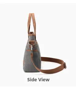 Vue latérale du sac fourre-tout en toile avec bordure brune et bandoulière tissée