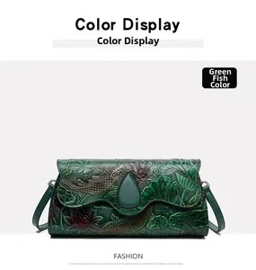 Detail of green leather crossbody bag with embossed koi fish and lotus floral patterns