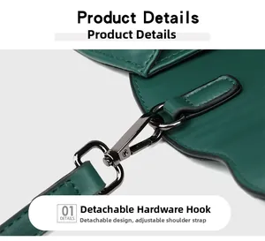 Detail of dark green embossed leather handbag with gun-metal hardware and detachable hook
