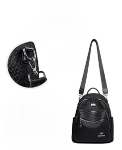 Close-up of pebble leather texture, kangaroo metal logo and detachable shoulder strap