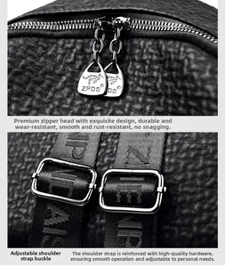 Detail of black lychee leather backpack with dual ZPDS zippers and adjustable straps