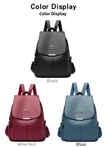 Detailed view of large capacity faux leather backpacks in black, burgundy and blue colors
