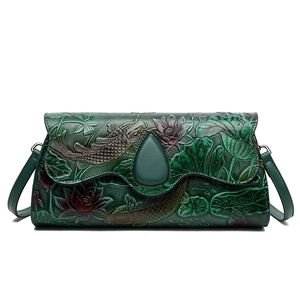 Vintage dark green embossed square bag with lotus pattern and shoulder strap
