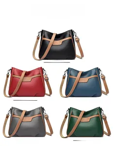 Detailed view of crossbody square bags in five colors with litchi texture and logo
