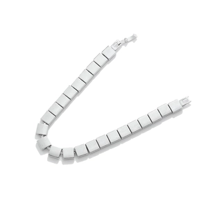 Macro detail of matte silver square link bracelet with precise metal fold-over clasp