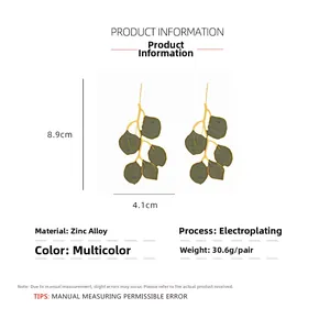 Detailed size view of green enamel leaf earrings with dimensions 8.9cm by 4.1cm