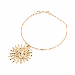 Golden torque necklace with a bold sun pendant in a minimalist bohemian style for women