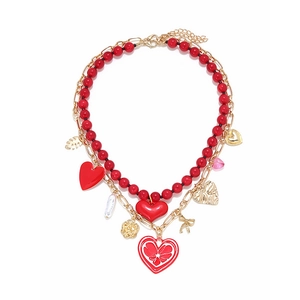 Double-layered gold necklace with red enamel hearts, rose charms, and white pearl droplet