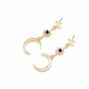 Golden moon and star earrings with blue crystals shown from a 45-degree angle