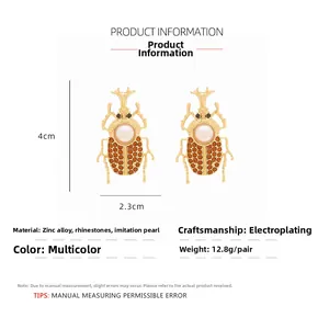 Detailed size chart of vintage beetle earrings with crystals and pearls measuring 4cm x 2.3cm