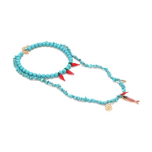 Double-layered turquoise beaded necklace with red pepper pendants and golden charms