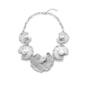 Irregular silver necklace with hammered metal flower pendants and baroque pearls