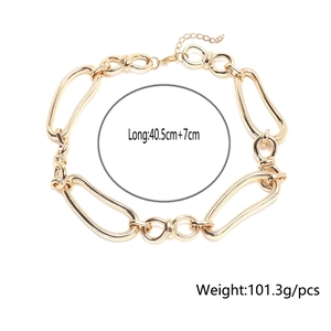 Detail of chunky gold geometric link necklace showing length 40.5cm and 101.3g weight