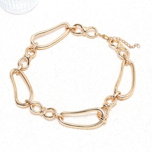 Gold chunky necklace with irregular teardrop hollow links and lobster clasp closure