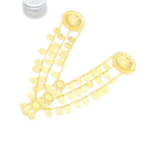 Exaggerated gold multi-layer coin waterfall brooch with intricate floral hollow carvings