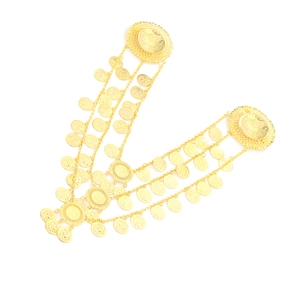 Detailed view of gold multi-layer coin waterfall brooch with exotic metal chains