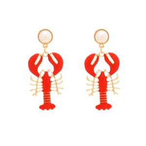 Exaggerated lobster drop earrings with white pearls and gold accents in red color