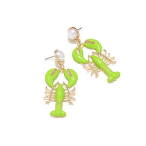Detail of neon green lobster earrings with faux pearl stud and gold metallic outlines