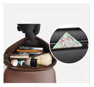 Detail view of large capacity crossbody bag interior with multiple storage compartments