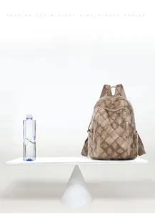 Lightweight brown quilted PU leather backpack weighing only 0.4kg for daily comfort