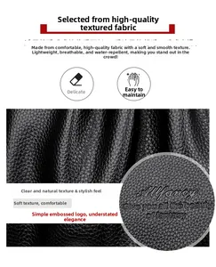 Macro della pelle nera con trama litchi impermeabile e goffratura del marchio Allfancy