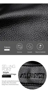 Close-up of black lychee grain leather with embossed logo and smooth texture detail