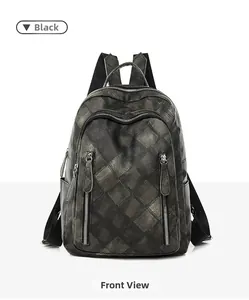 Front view of black PU leather backpack with diamond quilted pattern and silver zippers